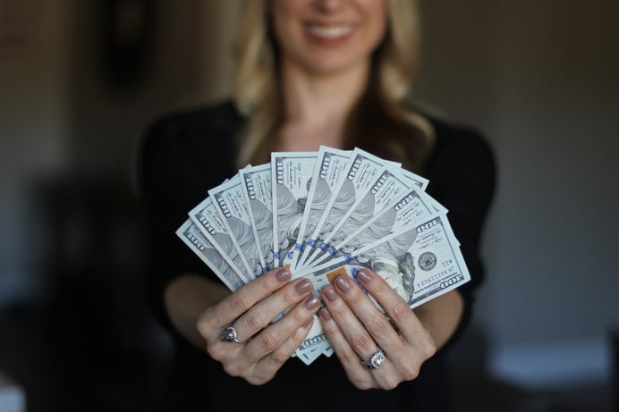 Wealthy Woman Showing Money